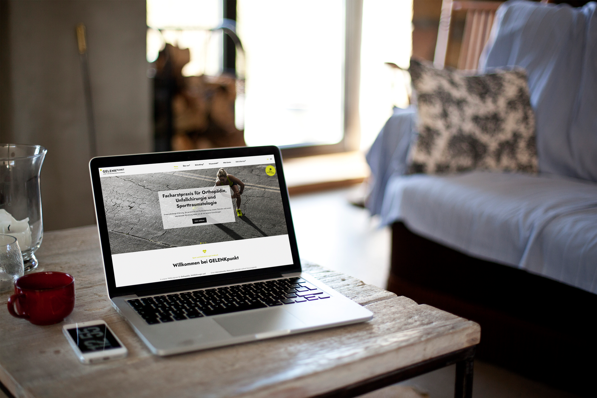 Eine Abbildung der Website von Gelenkpunkt auf einem Laptop